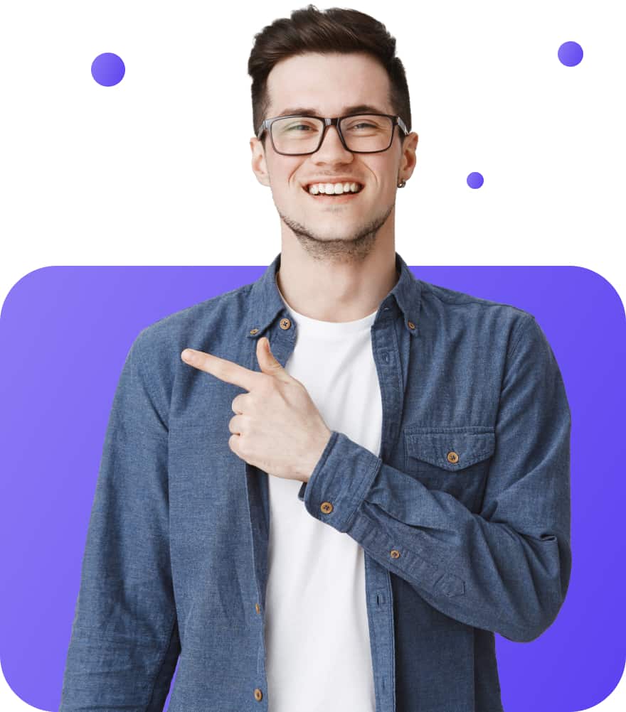 happy good looking man with glasses pointing finger left